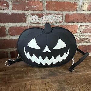 Matt engine, pumpkin black bag goes with everything for Halloween with tags